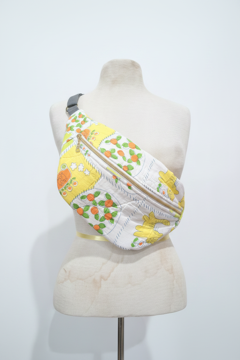 Citrus print crossbody on dress form - studio background